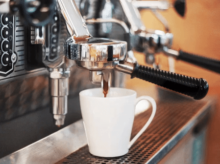 An animated gif of esspresso being poured